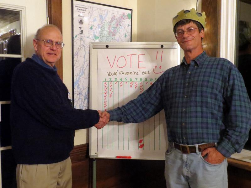 Board President John Atwood, left, congratulates John Wentzel, right, for winning the chili competition at the Sheepscot Valley Conservation Association November 9. Below: Volunteers try to pick their favorite chili at the annual volunteer appreciation celebration. Courtesy of Sheepscot Valley Conservation Association Board President John Atwood, left, congratulates John Wentzel, right, for winning the chili competition at the Sheepscot Valley Conservation Association November 9. Courtesy of Sheepscot Valley Conservation Association