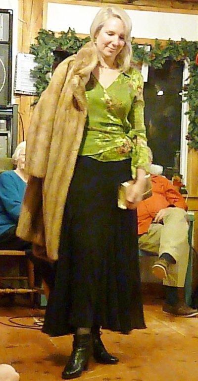 Marie MacDonald is ready for a night out in a vintage mink coat selling for $275, and a bright green top and skirt together retailing at $175, selling for $53. KATRINA CLARK/Boothbay Register Marie MacDonald is ready for a night out in a vintage mink coat selling for $275, and a bright green top and skirt together retailing at $175, selling for $53. KATRINA CLARK/Boothbay Register