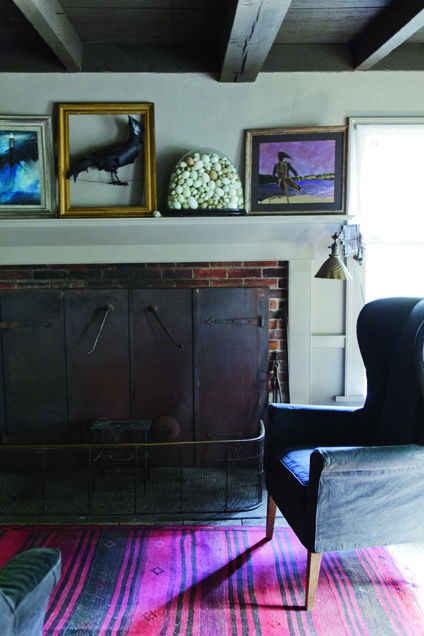 The Marston Home living room also doubles as a dining space and often the fireplace is used for cooking. Below: Sharon Mrozinski stands in the garden of Marston House wearing a ruffle-collared bid with pockets made her husband’s daughter Mali, an artist and sustainable clothing designer. Courtesy of Martha Stewart Living. The Marston Home living room also doubles as a dining space and often the fireplace is used for cooking.