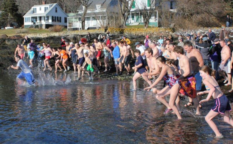 44 hardy souls greet 2012 with a quick, cold dip into Linekin Bay January 1 to raise funds for the YMCA's second grade swim program. The annual fundraiser drew record numbers of plungers and well-wishers to the Murray Hill boat launch on a beautiful, unseasonably warm New Year’s Day. SUE MELLO/Boothbay Register 44 hardy souls greet 2012 with a quick, cold dip into Linekin Bay January 1 to raise funds for the YMCA's second grade swim program. The annual fundraiser drew record numbers of plungers and well-wishers to the Murray Hill boat launch on a beautiful, unseasonably warm New Year’s Day. SUE MELLO/Boothbay Register