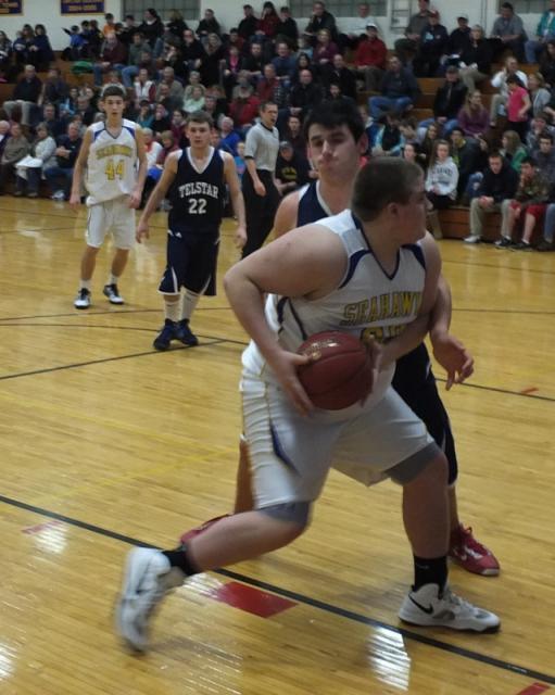 Shawn Simmons drives to the basket. The junior forward scored seven points for Boothbay. RYAN LEIGHTON/Boothbay Register Shawn Simmons drives to the basket. The junior forward scored seven points for Boothbay. RYAN LEIGHTON/Boothbay Register