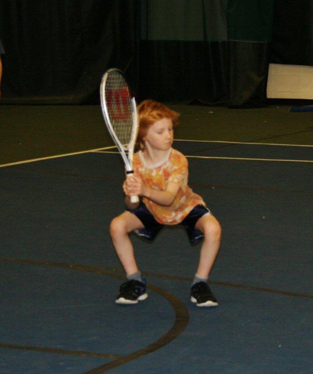 Andrew Gudroe awaits Coach Alex Arsenault's serve. Andrew Gudroe awaits Coach Alex Arsenault's serve.