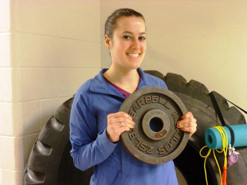 Melissa Hake, the Y’s Wellness Coordinator, holds the 25-pound weigh female contestants will be using during the “Legs of Steel” challenge. Below: Hake shows us that tires aren't just great for flipping, they can be a lot of fun, too. KATRINA CLARK/Boothbay Register Melissa Hake, the Y’s Wellness Coordinator, holds the 25-pound weigh female contestants will be using during the “Legs of Steel” challenge. KATRINA CLARK/Boothbay Register