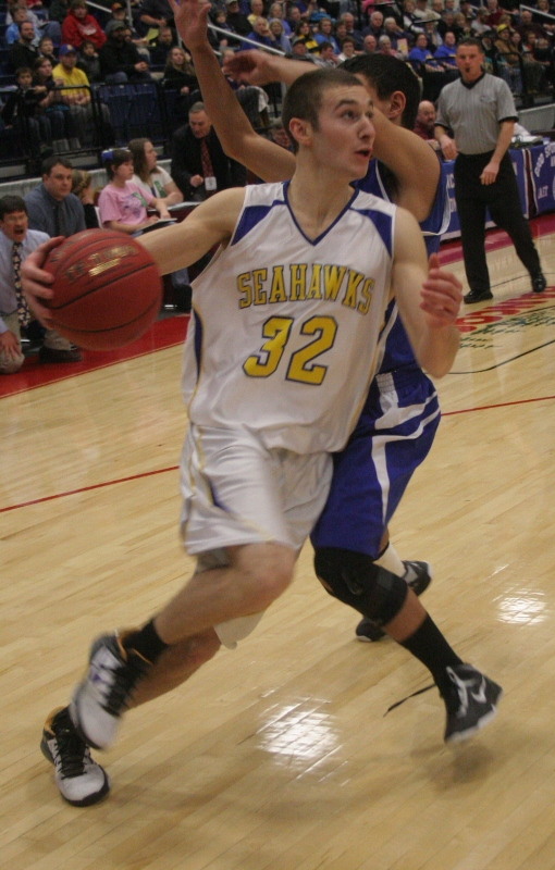 Anthony DiMauro gets a step on Madison's Derek LeBlanc on a drive to the hoop. KEVIN BURNHAM/Boothbay Register Anthony DiMauro gets a step on Madison's Derek LeBlanc on a drive to the hoop. KEVIN BURNHAM/Boothbay Register
