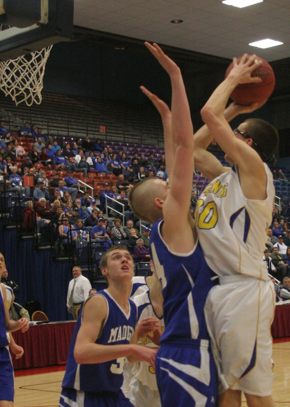 Evan Hepburn shoots over Madison's Steven Lawrence for two points in the second half. KEVIN BURNHAM/Boothbay Register Evan Hepburn shoots over Madison's Steven Lawrence for two points in the second half. KEVIN BURNHAM/Boothbay Register