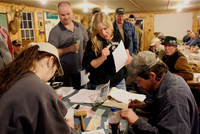 Sophia Stark, with membership papers in hand, waits to be officially signed in as a member by Treasurer Keith Royal. Stark was one of ten new members who joined the association during Wednesday’s celebration. SUE MELLO/Boothbay Register Sophia Stark, with membership papers in hand, waits to be officially signed in as a member by Treasurer Keith Royal. Stark was one of ten new members who joined the association during Wednesday’s celebration. SUE MELLO/Boothbay Register
