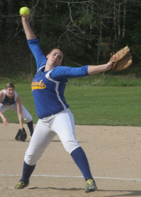 Allison Crocker gets ready to deliver a pitch in the first inning of Wednesday's home game against Lisbon. Below: Brenna Alley hauls in a fly ball in center field; Nicole Rice snares a throw from the catcher during Lisbon's Olivia Harrington's steal of third base during Wednesday's game. Shortstop Mikayla McFetridge is seen backing up the play. KEVIN BURNHAM/Boothbay Register Allison Crocker gets ready to deliver a pitch in the first inning of Wednesday's home game against Lisbon. KEVIN BURNHAM/Boothbay Register
