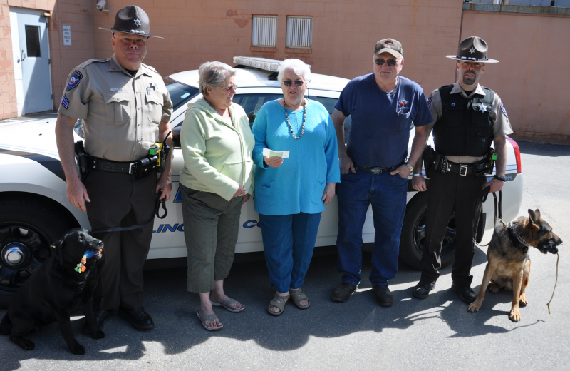 The Rotary Club of Boothbay Harbor presents Katharine Martin-Savage with a check for $1,000 for the Heidi Fund, which is used to purchase new dogs for the Lincoln County Sheriff's Office. From left: Sergeant Alan Shea, Debbie Graves, Katharine Martin-Savage, Daren Graves and Detective Scott Hayden. BEN BULKELEY/Boothbay Register The Rotary Club of Boothbay Harbor presents Katharine Martin-Savage with a check for $1,000 for the Heidi Fund, which is used to purchase new dogs for the Lincoln County Sheriff's Office. From left: Sergeant Alan Shea, Debbie Graves, Katharine Martin-Savage, Daren Graves and Detective Scott Hayden. BEN BULKELEY/Boothbay Register