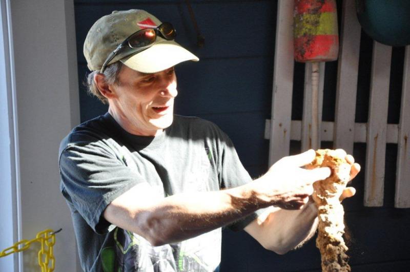 Some items Boone has found in his dives in Maine include a bevy of bottles, rusted mooring pieces (pictured), oarlocks, pliers and other discarded items. BEN BULKELEY/Boothbay Register Some items Boone has found in his dives in Maine include a bevy of bottles, rusted mooring pieces (pictured), oarlocks, pliers and other discarded items. BEN BULKELEY/Boothbay Register