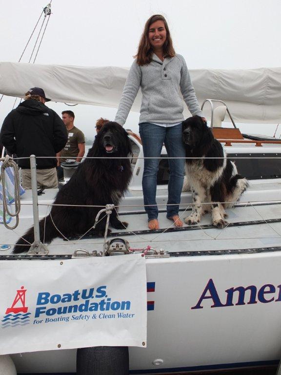 Michelle Levano, a summer intern, poses with Newfoundlands Smudge and Hickory, the furry mascots of the Rozalia Project. RYAN LEIGHTON/Boothbay Register Michelle Levano, a summer intern, poses with Newfoundlands Smudge and Hickory, the furry mascots of the Rozalia Project. RYAN LEIGHTON/Boothbay Register