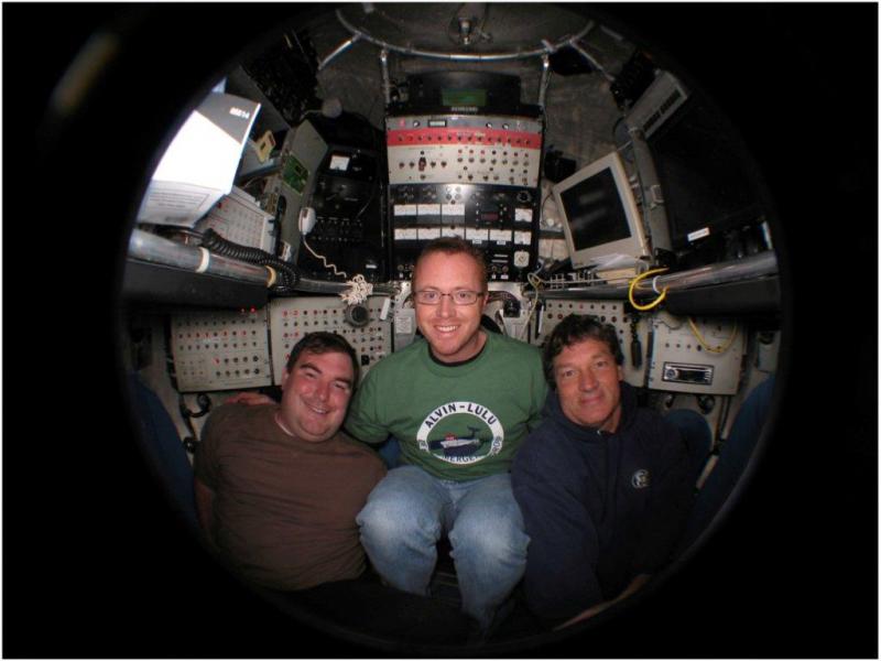 Dr. Pete Countway of Bigelow Laboratory, center, Dr. Shawn Polson of the University of Delaware, left, and submersible pilot Mark Spear of Woods Hole Oceanographic, right, aboard the Deep Submergence Vehicle Alvin during a dive to 2,000 meters at the Guaymas Basin hydrothermal vent field in the Gulf of California. Courtesy of Pete Countway.
