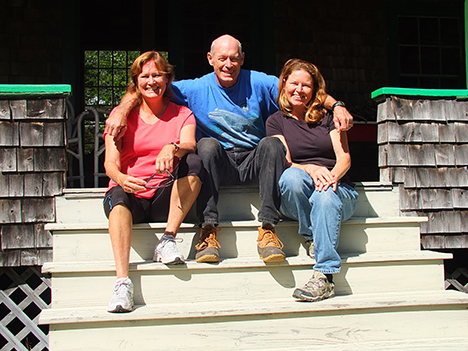 Nancy Thayer, Allen’s sister, Allen and Gracie sit on the steps at the big summer cottage Allen's grandfather, Frank Leonard Allen, built in 1912. The pair come to Boothbay Harbor every summer. When Allen's not sailing, Boothbay Harbor is his home port. While here, they stay in the cottage, which is at the top of Crest Avenue, beyond the Sprucewold cabins. The house has remained in the Allen family. It now belongs to the younger Allen and his three siblings, Nancy, Gregory and Bruce, and their familes. SUZI THAYER/Boothbay Register Nancy Thayer, Allen’s sister, Allen and Gracie sit on the steps at the big summer cottage Allen's grandfather, Frank Leonard Allen, built in 1912. The pair come to Boothbay Harbor every summer. When Allen's not sailing, Boothbay Harbor is his home port. While here, they stay in the cottage, which is at the top of Crest Avenue, beyond the Sprucewold cabins. The house has remained in the Allen family. It now belongs to the younger Allen and his three siblings, Nancy, Gregory and Bruce, and their familes.