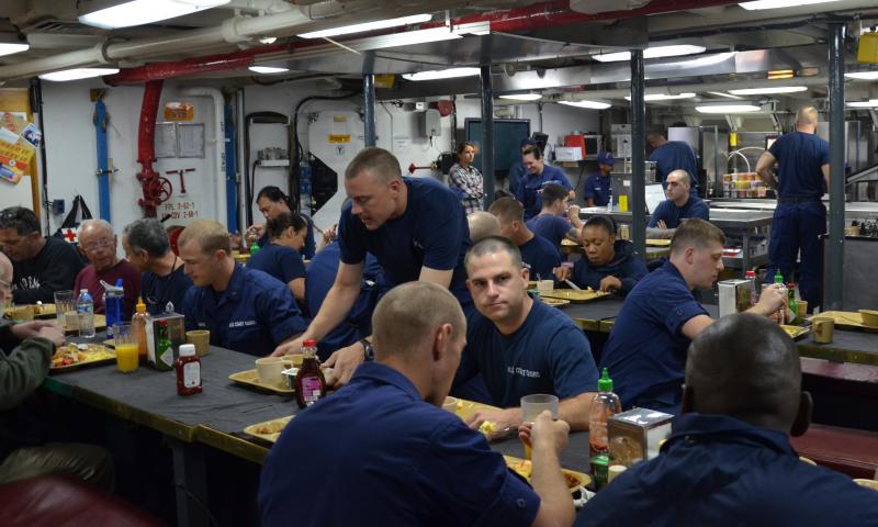 Mealtime on the mess deck. (Photo by Lynda Clancy)