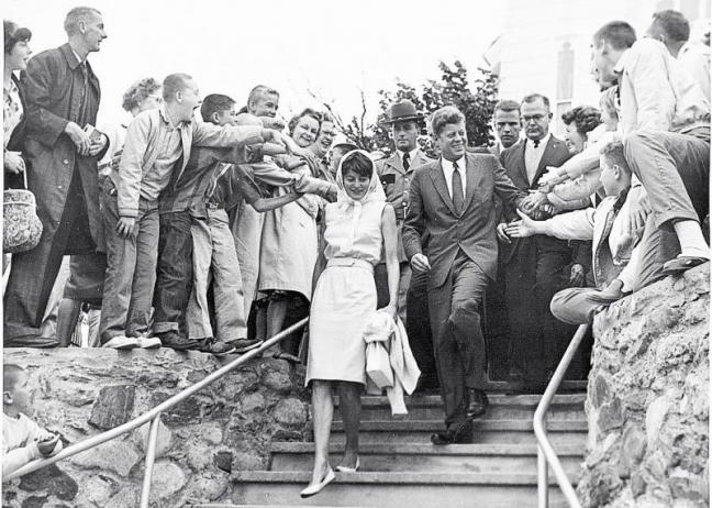 President John F. Kennedy and his sister, Patricia Kennedy Lawford, thronged by well-wishers as he leaves the 10 a.m. Sunday mass at Our Lady Queen of Peace in Boothbay Harbor on Aug. 12, 1962. Kennedy was the first president to visit Boothbay Harbor. Courtesy of Tom Carbone Archives