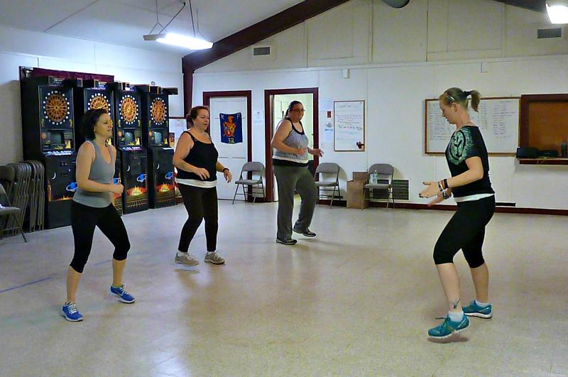 Students Brigitte Schlosser, Julie Coffin and Kristen Campbell follow along to Sarah Gudroe’s teaching. KATRINA CLARK/Boothbay Register