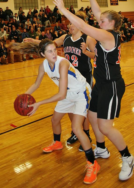 Freshman Kate Friant looks for a teammate after tracking down a loose ball under the basket in Monday’s scrimmage. KEVIN BURNHAM/Boothbay Register Friant