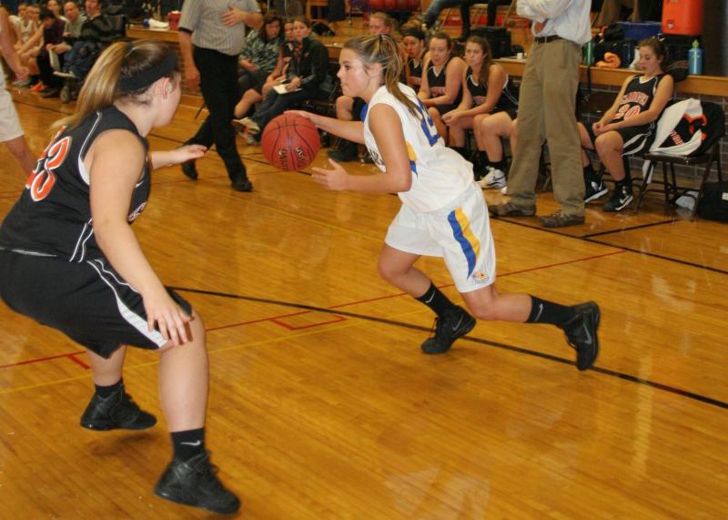 Brooke Alley, senior captain of the 2013-2014 Lady Seahawks basketball team, will be called upon for her leadership this season. Here she is looking to penetrate into the lane against Gardiner in Monday’s preseason scrimmage. KEVIN BURNHAM/Boothbay Register Alley