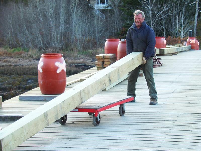 Larry Colcord shows off during the construction of the Pratt’s Island bridge in October. SUZI THAYER/Boothbay Register