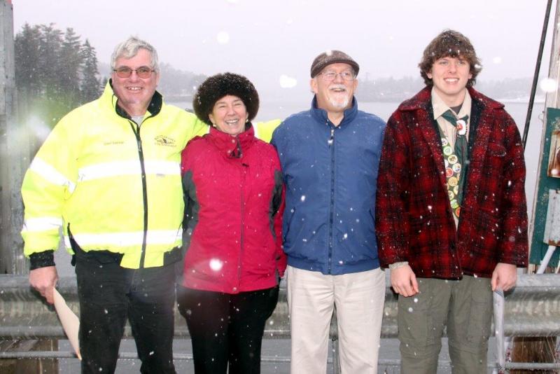 Southport selectmen Gerry Gamage, Mary Lou Koskela and Smith Climo greet Eagle Scout Sherman Brewer on the Southport Bridge after his ceremony, which was symbolic of him crossing over into the next phase of his life. Courtesy of Leisha MacDougall