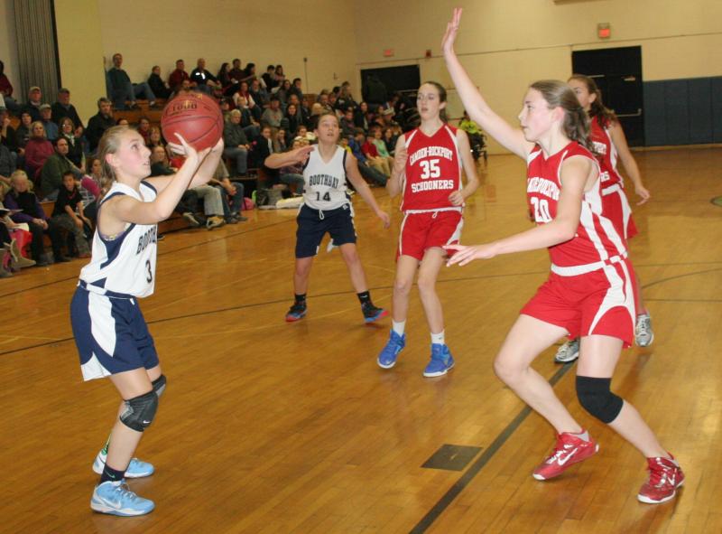 Eighth grader Sydney Mercier lines up a shot against Camden on Thursday. KEVIN BURNHAM/Boothbay Register Mercier