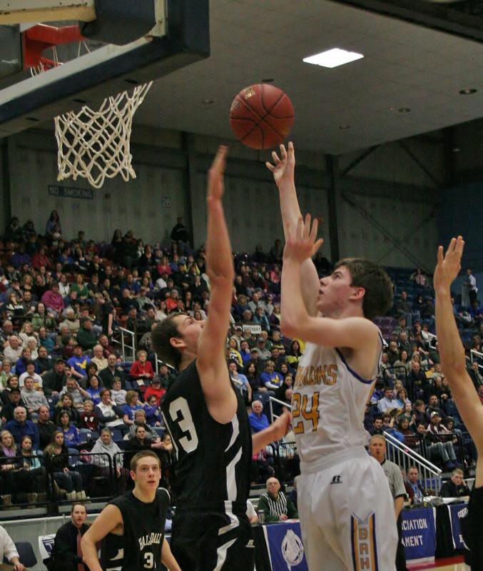 Sophomore Nick Gorey puts up a shot over Hall-Dale’s Bryson Camp during Monday’s game. KEVIN BURNHAM/Boothbay Register Gorey
