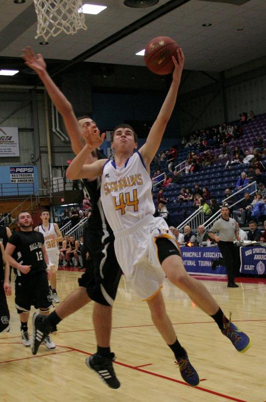 Freshman Jacob Leonard scores two of his 16 points late in the second half of Monday’s tournament game against Hall-Dale. KEVIN BURNHAM/Boothbay Register Leonard