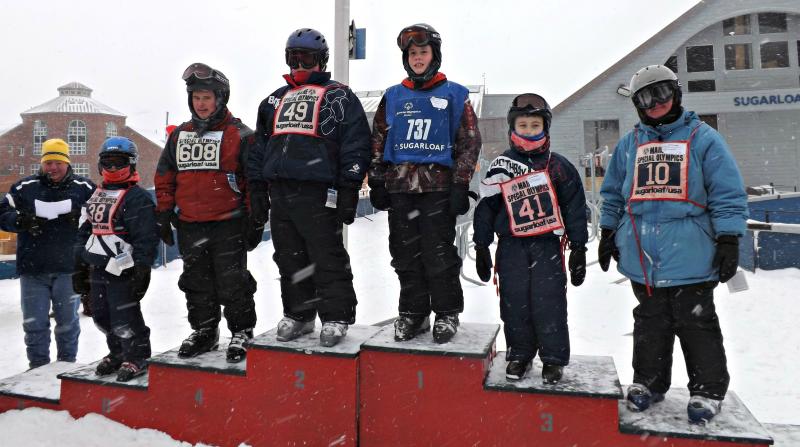 Bobby Edwards and DeShawn Averill from Boothbay receive their medals in the giant slalom event. Courtesy of Toby LeConte