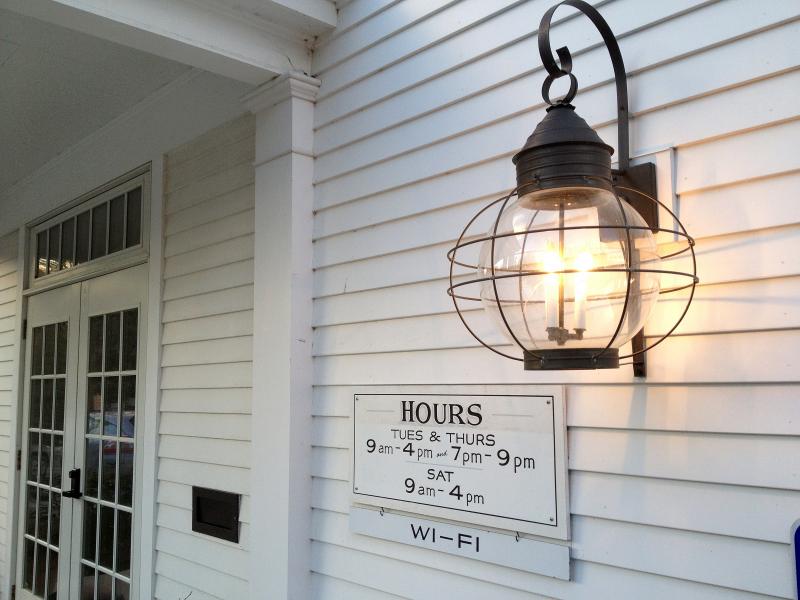 THIS STYLISH outdoor wall sconce light the way to the new front door. RYAN LEIGHTON/Boothbay Register
