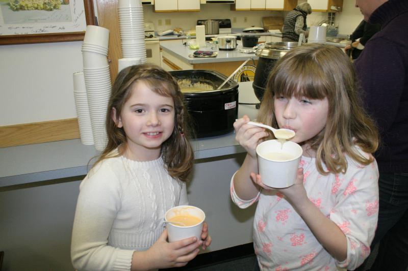 The chowder was just right for these two young girls. KEVIN BURNHAM/Boothbay Register
