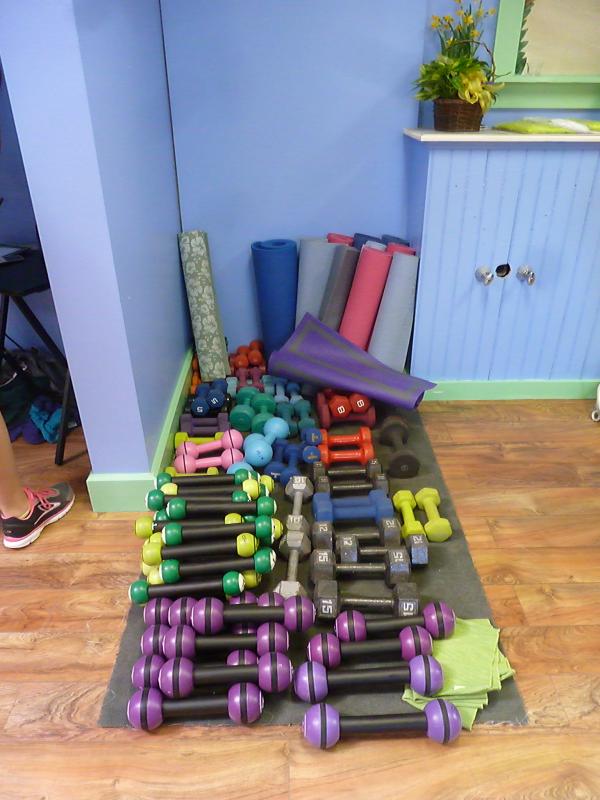 Don’t have weights for toning dances? No problem: a huge pile to choose from await at the studio. KATRINA CLARK/Boothbay Register
