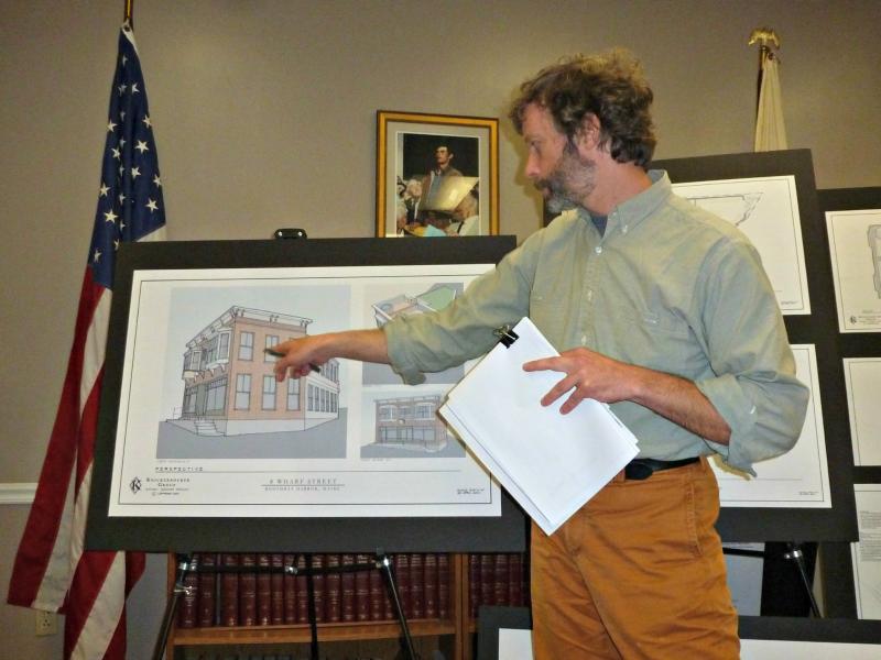 Adam Maltese of Knickerbocker Group discusses the new building being planned for 8 Wharf Street. Here he shows the view of the building as seen from the front of the Ice Cream Factory on Pier 1. KATRINA CLARK/Boothbay Register