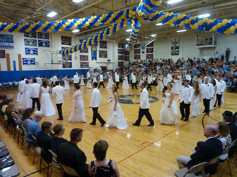 A ring of graduates perform the Grand March at Boothbay Region High School on June 6. KATRINA CLARK/Boothbay Register