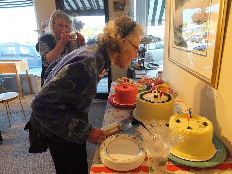 Making a wish on May 31 at her art opening reception and early (one day) birthday party at Gold/Smith Gallery.
