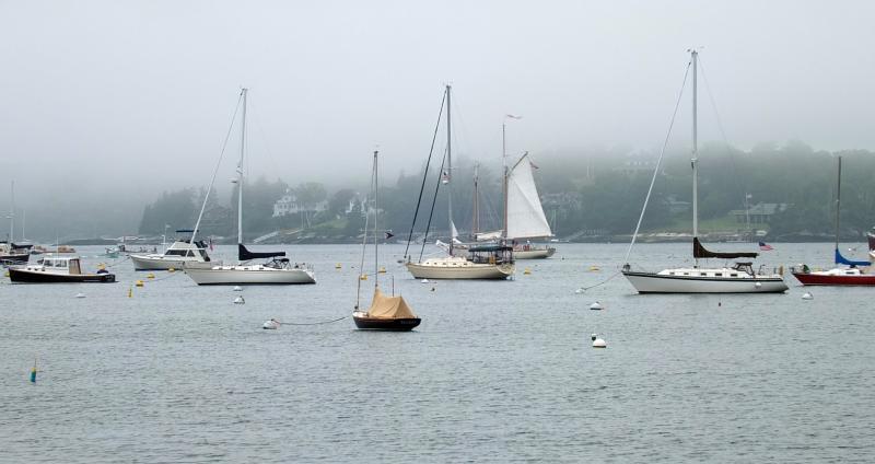 A SCHOONER raises its sails as it sails out of the harbor on a cool breeze on July 3. SUZI THAYER/Boothbay Register