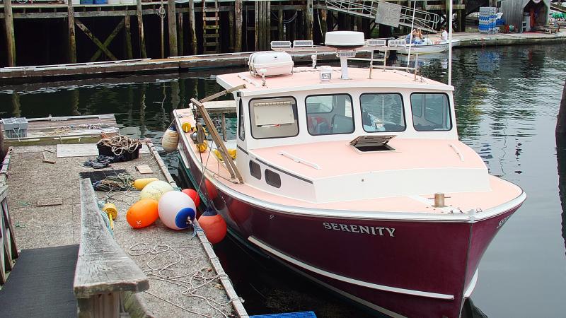 THE LOBSTER BOAT SERENITY at rest in front of the Sea Pier in Boothbay Harbor on July 3. SUZI THAYER/Boothbay Register