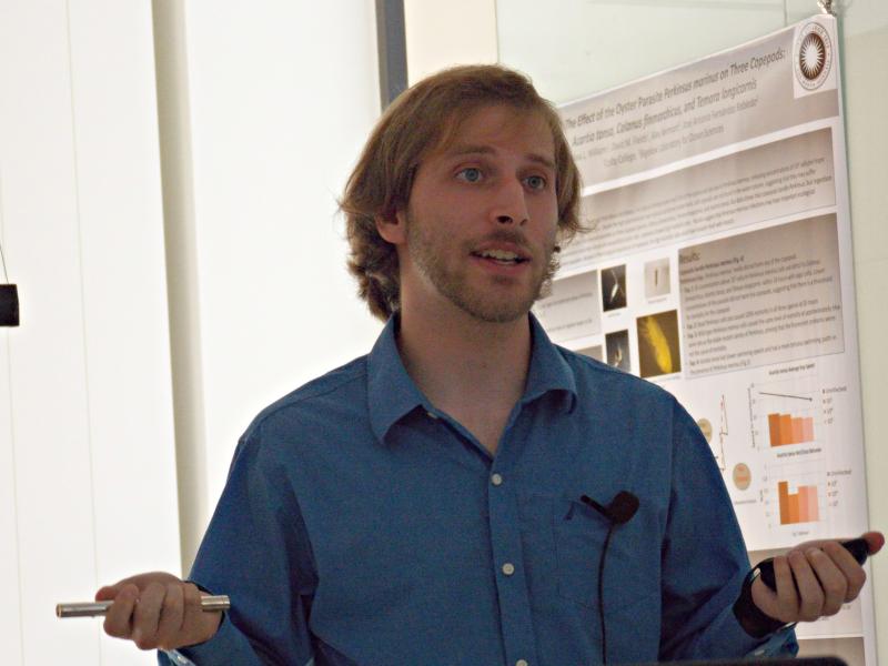 Daniel Seidman answering questions about his project, “A model of population dynamics for the life stages on salpa fusiforma in the Gulf of Maine.” KATRINA CLARK/Boothbay Register