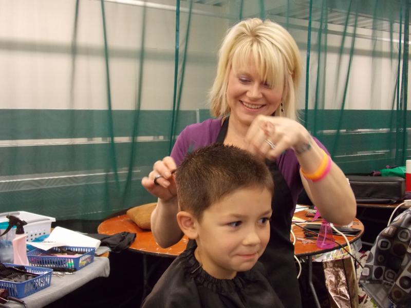 Colby Hicks get a cut from unTangled owner and stylist Kristy Anderson. He’s a bit nervous, but it turns out wonderful. KATRINA CLARK/Boothbay Register