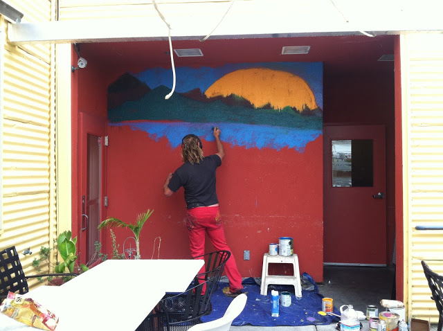 DOUGLAS DESJARDINS at work on a large painting. Courtesy of Douglas Desjardins
