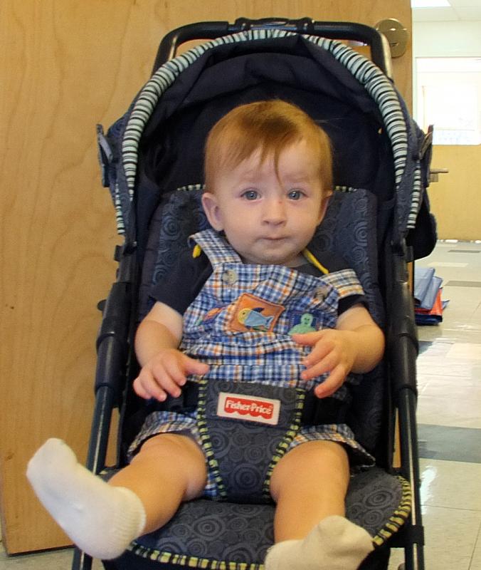NICHOLAS COLBY, too young to start school, came with mom Ekaterina to help sister Samantha get situated. SUZI THAYER/Boothbay Register