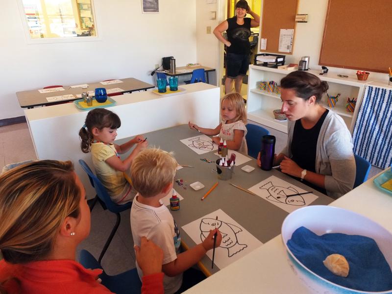 ASSISTANT TEACHER Lara Mann, right, oversees an art class at the new Harbor Montessori School. SUZI THAYER/Boothbay Register