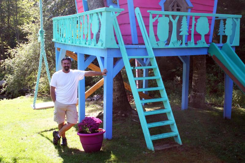 RONNIE CAMPBELL claims he’s not an artist, but he designed and built this very artful treehouse for his daughter Brianna’s third birthday. SUZI THAYER/Boothbay Register