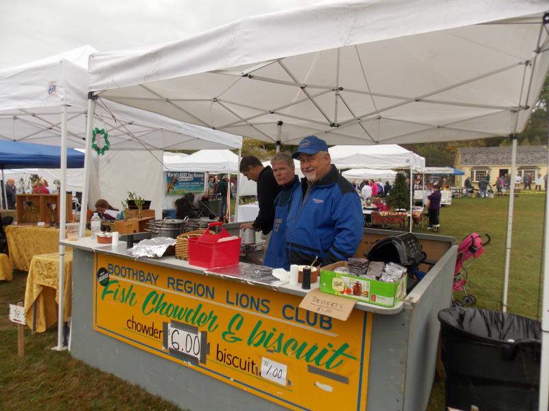 The Lions Club of Boothbay Harbor sold fish chowder and biscuits. A customer eating some as he walked away turned around and said it was excellent. KATRINA CLARK/Boothbay Register