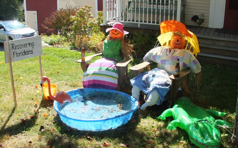 The Recovering Floridians’ scene at Holly and Jack Fulmer’s features a smiling couple enjoying some Samuel Adams beers next to their pool, with an alligator and a flamingo keeping them company. SUZI THAYER/Boothbay Register
