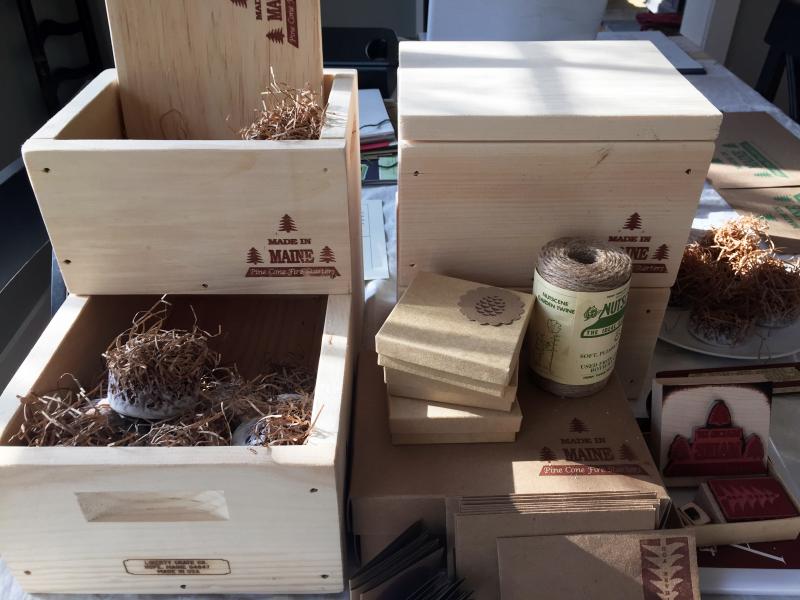These wooden crates, made by Liberty Crate Co. in Hope, Maine, are a nice way to display the fire starters on a hearth or next to a wood stove. SUZI THAYER/Boothbay Register
