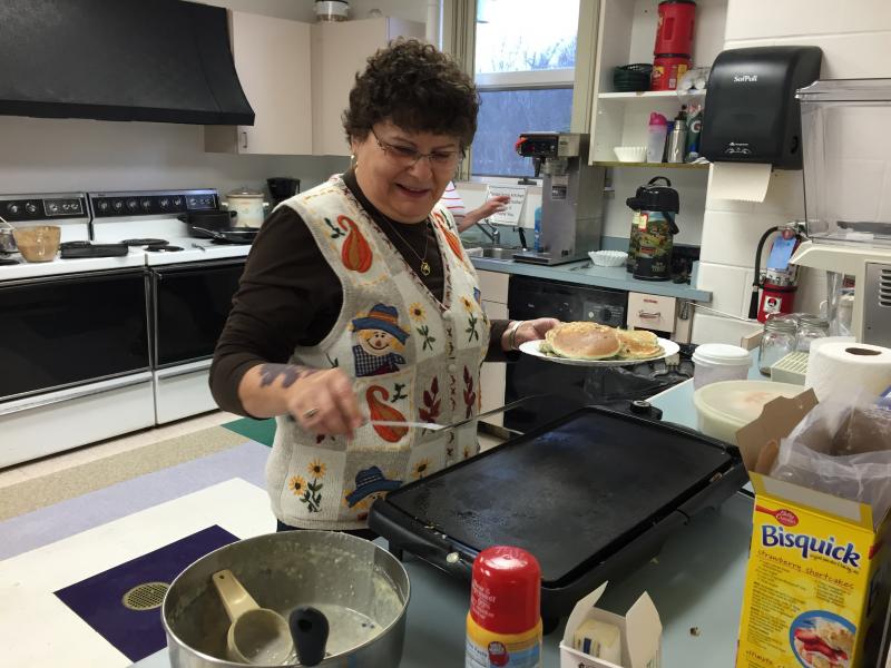 YMCA Administrative Assistant Doris Welch prepared pancakes for the Active Older Adults Thanksgiving breakfast at the YMCA on Nov. 17. SUZI THAYER/Boothbay Register