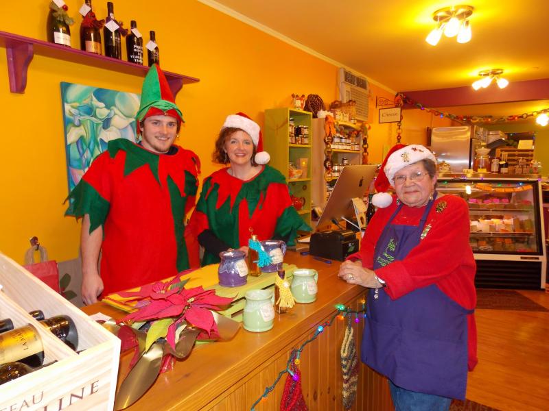 A trio of holiday elves at Eventide during Men’s Night. From left: Ron Finlay, Kristen McEvoy and Mim Martin. KATRINA CLARK/Boothbay Register