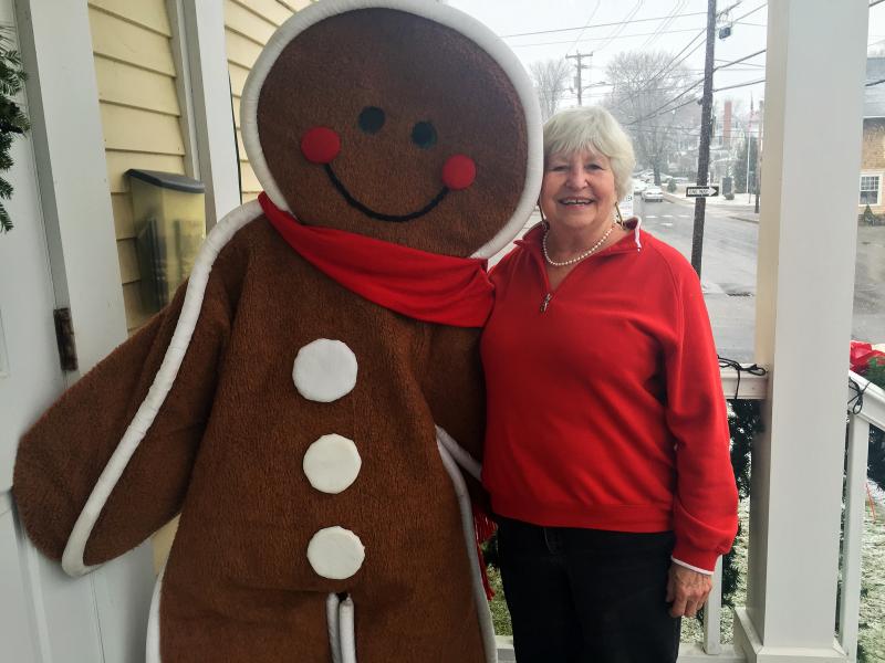 The gingerbread “man” and his handler, Joanne Platt, take a breather outside the Opera House on Saturday, Dec. 14. SUZI THAYER/Boothbay Register