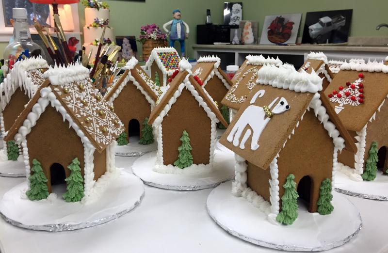 Gingerbread houses were in all stages of completion at Patricia Moroz’s workshop on Nov. 26. SUZI THAYER/Boothbay Register