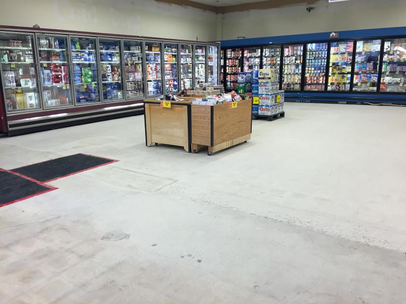 Liquor and other items have been temporarily moved from this area of the store to allow for floor replacement. SUZI THAYER/Boothbay Register