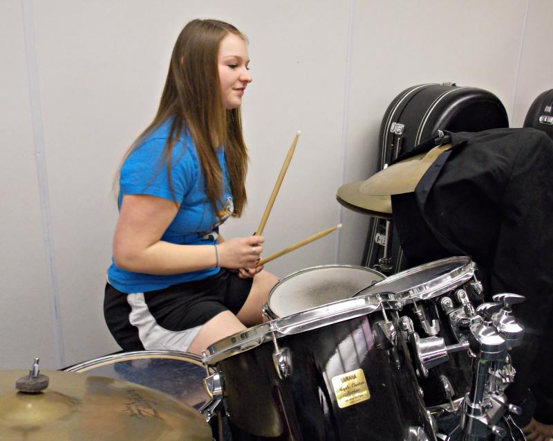Charlene Reed on drums during the “learn a new instrument” elective. KATRINA CLARK/Wiscasset Newspaper